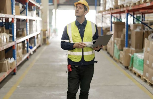 A manager checking warehouse. Logistic Solutions