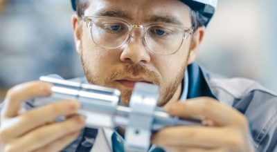 mechanical-engineer-inspecting-component Mechanical Engineer Inspecting Component