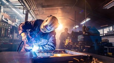person-in-welding-safety-gear-is-welding Person in Welding Safety Gear Is Welding