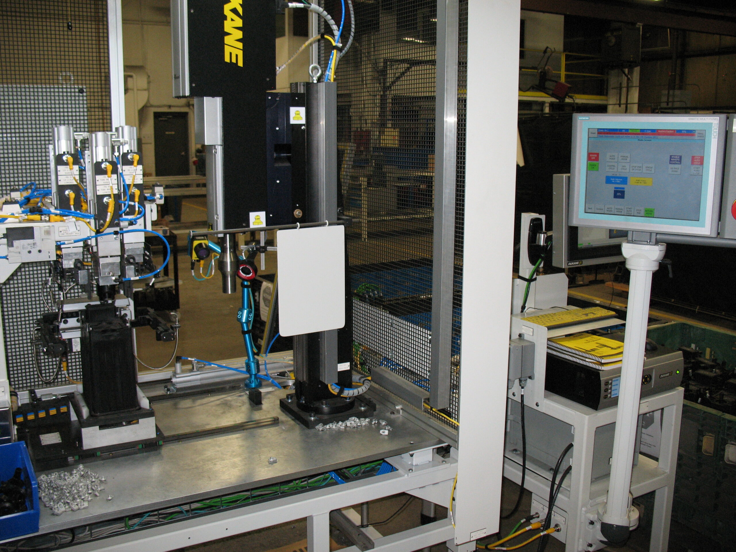Balancing Quality and Cost in Custom Automated Assembly Systems for High-Mix, Low-Volume Manufacturing